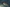 Editorial image of woman in white linen floating in water