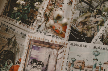 Tarot cards spread on a neutral surface with flowers.