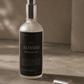 Bottle of 'Altered Meditation Mist' on a textured surface with a neutral background.