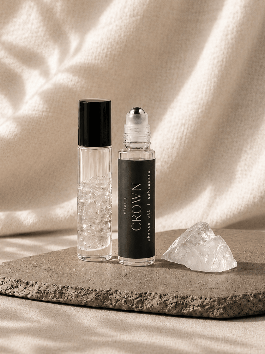 Crown Chakra Balancing Roller with quartz by Alchemist + Co. on neutral background.