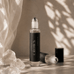 Crown Chakra Balancing Roller with quartz by Alchemist + Co. on neutral background.