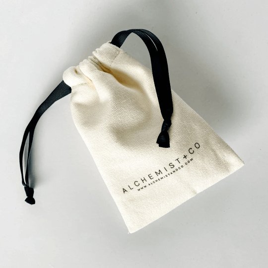 Cotton draw string bag for rituals oils, chakra balancing rollers, and energy cleansing rollers by Alchemist + Co