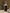 Bottle of 'Florida Water Meditation Mist' on a textured surface with decorative items in the background.