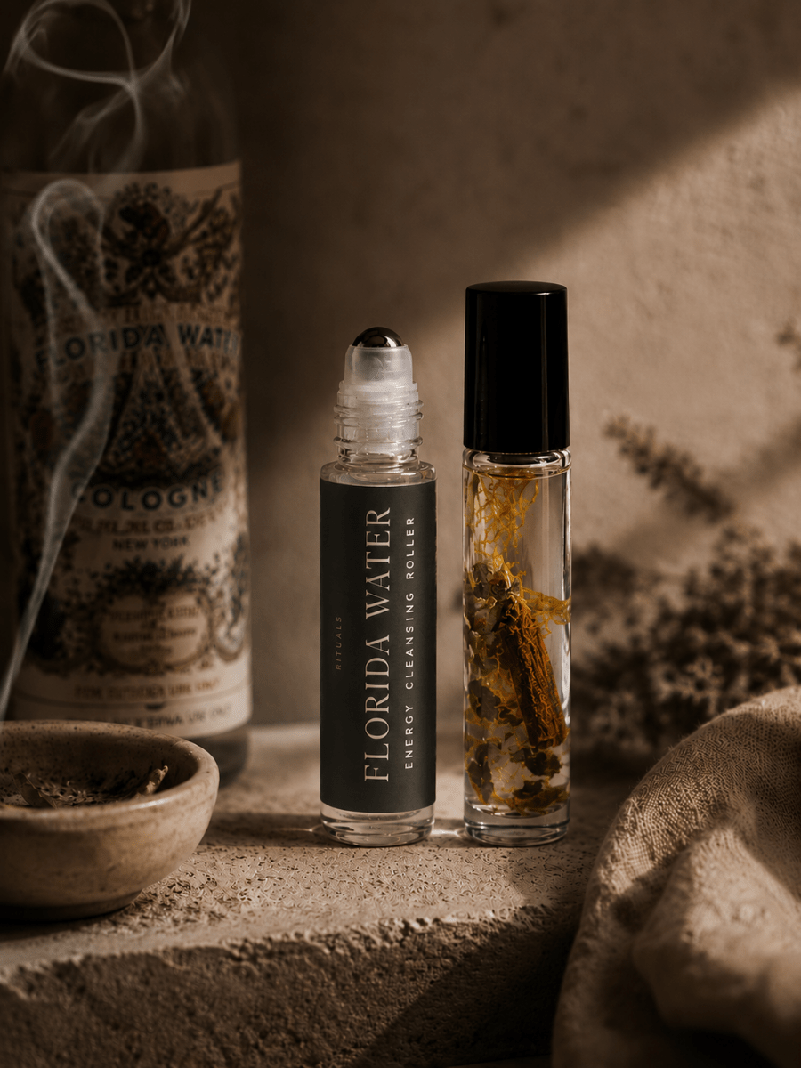 Two small bottles labeled 'Florida Water' on a textured surface with a warm, earthy background.