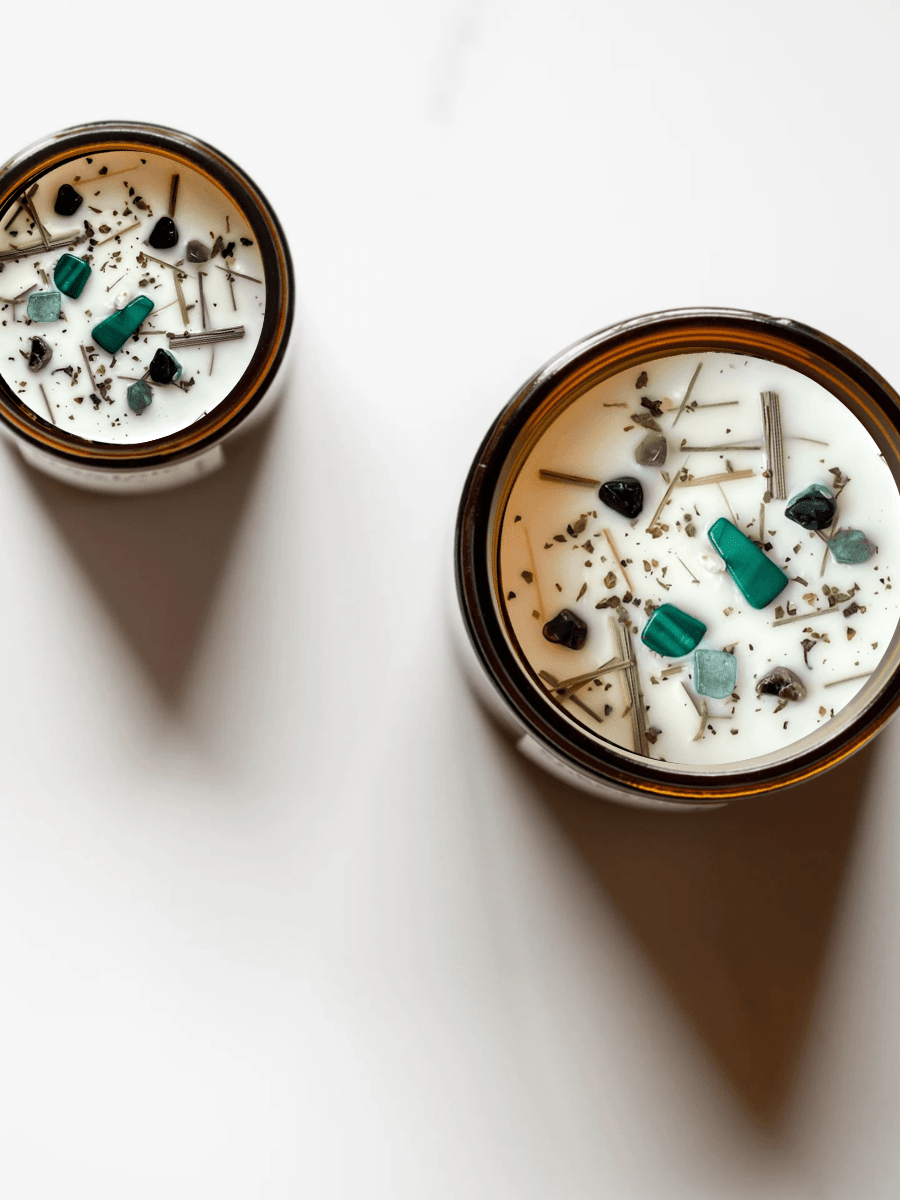 Top view of Zen ritual candle with malachite, black tourmaline, and botanicals.